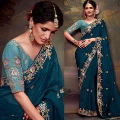 Crafted with care and attention to detail, this saree is perfect for those who appreciate fine craftsmanship and unique design. The light color exudes elegance and sophistication, making it a standout choice for any special occasion. Whether you're attending a wedding or celebrating a festival, this saree is sure to make you feel like a true queen. Make a statement with our attractive organza saree, designed to turn heads and leave a lasting impression.  --------------------------------- S A R E E ● D E T A I L S --------------------------------- ● Fall and Edging : Done ● Tassel : See in Option ● Petticoat : On request Extra Charges ● Drapping Saree (Ready to wear) : On Request Extra Charges ● Blouse : Matching Unstitched Piece (See in option) ● Occasion : Wedding, Party, Festive, Functio Elegant Dola Silk Fabric With Unstitched Blouse, Elegant Dola Silk Embroidered Fabric With Unstitched Blouse, Elegant Embroidered Dola Silk Fabric With Unstitched Blouse, Elegant Dola Silk Fabric For Unstitched Blouse, Elegant Semi-stitched Saree For Navratri, Elegant Blue Embroidered Fabric For Navratri, Elegant Embroidered Chinon Fabric With Pallu, Fitted Saree With Intricate Embroidery For Diwali, Elegant Embroidered Unstitched Blouse For Navratri