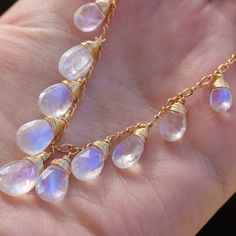 Rainbow Moonstone Necklace Moonstone Necklace Blue Flash Moonstone Drop Necklace Rainbow Moonstone Pendant Precious Statement Necklace Gold (23862 - 4) Moonstone Briolette Gemstone Necklace, Moonstone Gemstone Necklace In Briolette Shape, Moonstone Drop Necklace With Natural Stones, Drop Moonstone Necklace With Natural Stones, Enchanting Jewelry, Elegant Statement Necklace, Enchanted Jewelry, Clothing Aesthetic, Rainbow Moonstone Necklace