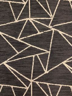 a black rug with white lines on it