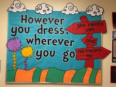 a bulletin board that says, however you dress, wherever you go with dr seuss