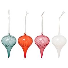 three different colored glass ornaments hanging from strings