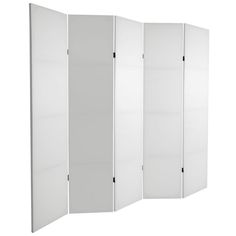 a white room divider with four doors