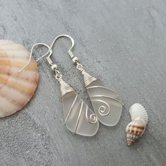 "Aloha! These design shows my love for this beautiful island of Hawaii. This item will be made to order and shipped directly from Hawaii. This is sea glass earrings with silver hooks. This handmade in Hawaii jewelry gift is from cultured sea glass that are specially formed into its shape for jewelry making. Each comes with a gift box with \"handmade by yinahawaii\" stamp and a ribbon wrapped as shown in the 2nd photo, ready to give as gift. I also offer Free gift messaging with the order. Please Nickel-free Sea Glass Jewelry For Jewelry Making, Nickel Free Sea Glass For Jewelry Making, Nickel-free Glass Jewelry For Beach, Nickel-free Glass Jewelry For The Beach, Silver Wire Wrapped Jewelry For Beach, Beach Wire Wrapped Glass Jewelry, White Sea Glass Jewelry Gift, Handmade Dangle Sea Glass Jewelry, Handmade Sea Glass Dangle Jewelry