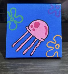 a painting of a pink jellyfish on a blue background