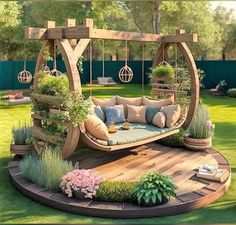 a wooden swing bed in the middle of a yard with flowers and plants on it