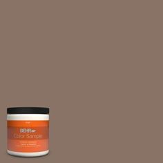 the behr paint color sample is shown in an orange, green and black hue