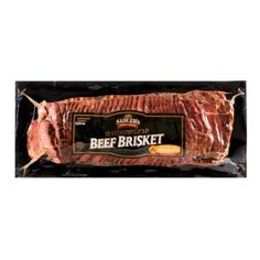 the beef brisket is wrapped in plastic