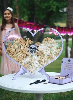 a table topped with a heart shaped display