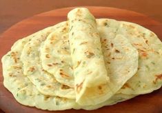 several flat breads stacked on top of each other