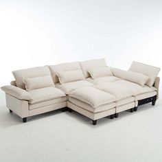 Experience unparalleled comfort with our Double Cushion Sofa, designed for a luxurious embrace. The top cushion, filled with pure high-density foam, offers a soft, cloud-like sensation, while the lower cushion, supported by pocket springs, ensures lasting support. Crafted with a robust wood and iron frame, this sofa can bear up to 330 lbs, perfect for everyday use. The multi-functional design allows for secure seating with screws and easy reconfiguration to suit your lifestyle. Wrapped in high-quality Ice Velvet fabric, it's not only warm and fluffy but also wear and fade resistant, with armrest bags and multiple pillows for ultimate relaxation. Upholstery Color: Beige | Latitude Run® Oversized Modular Sofa, Velvet Large U-Shaped Couch Comfy Upholstered 4-Seat Sofa w / 2 Ottoman, 4 Lumbar Couch Comfy, Shaped Couch, U Shaped Couch, Sofa Velvet, Modular Couch, Cushion Sofa, Comfy Couch, Velvet Sofa, Modular Sofa