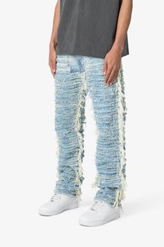 the V631 Allover Frayed Denims are designed with a baggy fit throughout, featuring a vintage wash, exposed and raw seams throughout, and finished off with raw hem. details relaxed fit* 100% cotton zipper at inseam model is 6’1, 140 lbs and wears a size 30 Distressed Dark Wash Rigid Denim Flare Jeans, Urban Ripped Cotton Jeans, Urban Style Ripped Cotton Jeans, High Rise Distressed Cotton Jeans, Ripped Cotton Jeans For Streetwear, Urban Distressed Denim Blue Flare Jeans, Urban Style Distressed Denim Blue Flare Jeans, Urban Denim Blue Distressed Flare Jeans, Distressed Blue Flare Jeans For Streetwear