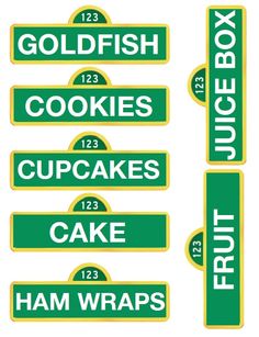 some green and yellow street signs that say goldfish cookies cupcakes cake ham wraps