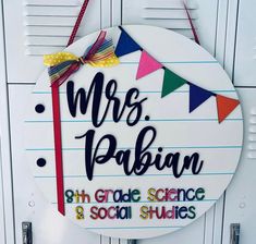 a sign that says mrs pabiyan 8th grade science and social studies on it