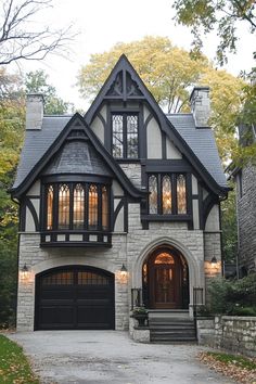 Stunning house with Tudor architecture and modern elements. The charming fusion of history and contemporary flair in modern Tudor houses can transform your living space from “just nice” to “royalty-approved.” Tudor Architecture, Tudor Homes, Goth House, Goth Houses, Tudor Cottage, Tudor Revival