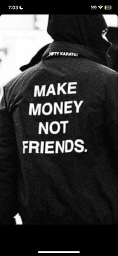 someone wearing a jacket that says make money not friends