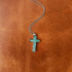 Express your faith with this dainty, beautiful necklace. Our GENUINE STONE CROSS NECKLACE is simple, yet powerful. Designed with one-of-a-kind durable 316L Stainless Steel crushed Turquoise. Perfect for everyday wear and other special occasions. ABOUT THIS PRODUCT Material: 316L Stainless Steel Stone Options: Genuine TurquoiseColor*/Finish: Silver Size: 16” Chain + 2" Extender Pendant Size: 1.22 inches x 0.67 inches Handmade Turquoise Cross Pendant Necklace, Spiritual Cross Turquoise Necklace For Gift, Spiritual Turquoise Cross Necklace For Gift, Spiritual Turquoise Cross Necklace As Gift, Spiritual Turquoise Cross Necklace, Spiritual Turquoise Necklace With Cross Pendant Gift, Spiritual Turquoise Cross Pendant Necklace Gift, Turquoise Cross Pendant Necklace For Gift, Turquoise Cross Pendant Necklace As Gift