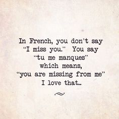 an old typewriter with the words in french, you don't say i miss you