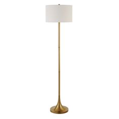 a gold floor lamp with a white shade