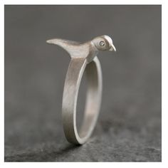 Bird Perched On Flat Band Ring In Sterling Silver With Diamond Eyes. The Bird Is Approx. 5/8" Long, 3/16" Wide, And 3/16" High, Not Including The Shank. Michelle Chang, Silver Bird Ring, Bird Ring, Bird Rings, Silver Bird, Carved Ring, Shiny Objects, Metal Clay Jewelry, Diamond Eyes