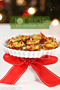 mini quiche with hashbrown crust in a white dish tied with a red ribbon