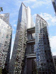 the tall buildings are all made up of different shapes and sizes, including one that looks like cubes