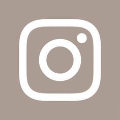 the instagram logo on a brown background