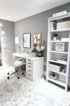 a white desk and chair in a room