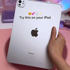 someone is holding an ipad with the text try this on your ipad