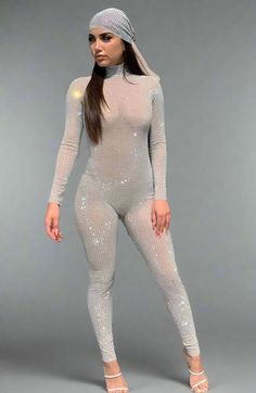 The Sparitic Crystal Customized Jumpsuit is a one-of-a-kind piece of clothing. It is adorned with over 5000 crystals, making it a truly unique and eye-catching piece. It takes 3-5 weeks to complete, but if you need it sooner, you can add a rush service to your order. This jumpsuit is perfect for any special occasion, and will make you stand out from the crowd. With its intricate design and luxurious materials, it is sure to be a showstopper. Order your Sparitic Crystal Customized Jumpsuit today Fly Girls, Custom Boots, Waist Trainer Corset, How To Stretch Boots, Fly Girl, Intricate Design, It Takes, Custom Items, Large Black