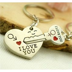 a keychain with two keys attached to it that says dear, see if we were