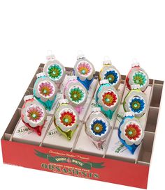 twelve ornament ornaments in a display box