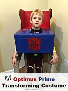 a young boy wearing a transformer costume with the words diy optmus prime transforming costume