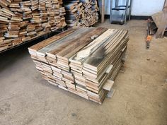 several stacks of wood in a warehouse