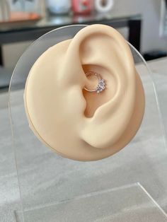 This daith earring is cute and minimalistic, a perfect sparkly piece for your collection. This piercing is made of 14k Rose Gold coated brass. Piercing is bendable, and bends into place (not a clicker). Also available in silver (platinum plated) and gold (14k gold plated) **PACKAGE INSURANCE: Please either upgrade to priority express shipping at checkout if you would like to insure your package OR you can also purchase insurance separately Insurance up to $100 for $1.50 here: https://www.etsy.co Minimalist Rose Gold Cartilage Earrings For Wedding, Rose Gold Minimalist Cartilage Earrings For Weddings, Dainty Small Hoop Cartilage Earrings For Wedding, Dainty Rose Gold Hoop Piercings, Hypoallergenic Rose Gold Wedding Piercings, Minimalist Internally Threaded Cartilage Earrings For Wedding, Tiny Minimalist Cartilage Earrings For Wedding, Minimalist Hypoallergenic Wedding Cartilage Earrings, Rose Gold Small Hoop Piercing For Gift