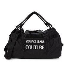 Black Travel Bag From Versace Jeans Couture. Printed At Front With A Silver-Tone Logo, This Design Secures With A Velcro Fastener And Two Zippers And Features Two Half-Round Handles, A Top Handle, Detachable Shoulder Straps (Item Can Be Worn As Backpack), A Detachable And Adjustable Shoulder Strap, Silver-Tone Metal Hardware And One Internal Compartment With Two Slip Pockets And One Zip Pocket. Height: 26cm Width: 51cm Worn Only Once However There Is Some Smudges On The Logo And Zipper Pull Is M Black Travel Bag, Jeans Collection, Black Travel, Travel Duffle, Versace Jeans Couture, Versace Jeans, Black White Fashion, Overnight Bag, Metal Hardware