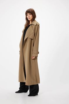 An exquisite piece with modern style, the SOPHIE RUE Mille Trench Coat is perfect for any fashion-forward wardrobe. Featuring a full-length design and trench cut silhouette, the coat includes elegant, belted cuffs, a removeable tie belt, and oversized notched lapels with a storm flap. A timeless and luxury-filled piece, this coat is the perfect way to stay stylishly chic in any weather. **Sizing notes: This style runs TTS. 51" length XS=0-2, S=4-6, M=8, L=10. MATERIALS: 67% Polyester, 29% Rayon, Elegant Khaki Outerwear With Belted Cuffs, Long Belted Outerwear For Work, Elegant Long Khaki Outerwear, Black Friday Shopping, Staple Pieces, Black Friday Sale, Waist Belt, Caribbean Netherlands, Style Guides