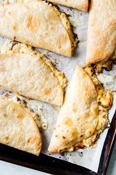 some food is laying out on a baking sheet and ready to be baked in the oven