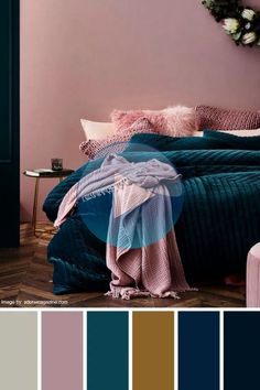 a bedroom with pink, teal and blue colors