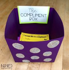 a purple box with silver polka dots and a sign that says the compliment box i would like to compliment for you