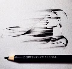 a pencil drawing of a woman's face with the words derwent & charcoal