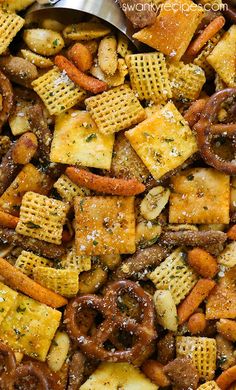 a close up of cheesy crackers and pretzels