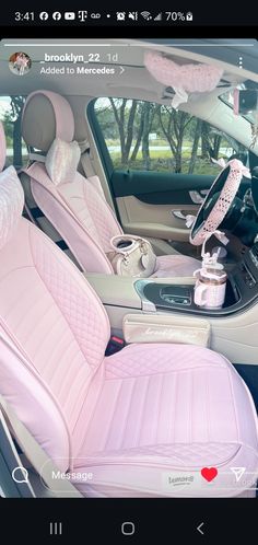 the interior of a car with pink seats