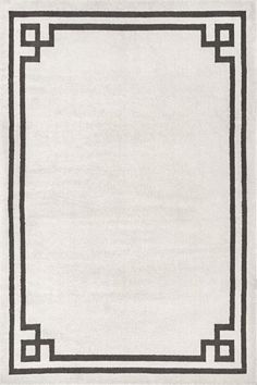 a white rug with a black border on it