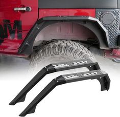 the front bumper and tire guards on a red jeep