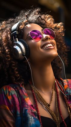 a woman wearing headphones and sunglasses smiling