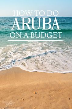 the beach with text overlaying how to do aruba on a budget