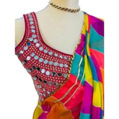 Contemporary multi colored saree that fits any occasion. Ideal as festive wear, wedding wear, casual or cocktail dine in.  this 5.5 meters of elegance as beautiful detailing with exclusive Gota Patti work from Rajasthan to enhance the look. The leightweight and soft material makes it very easy to drape and carry. Comes with very contemporary unstiched blouse material which can be mix and matched with other outfits. Multicolor Choli With Traditional Drape For Party, Multicolor Traditional Drape Choli For Party, Multicolor Choli For Party With Traditional Drape, Bollywood Style Multicolor Choli With Cutdana, Summer Saree With Mirror Work, Festive Multicolor Choli With Mirror Work, Multicolor Semi-stitched Georgette Choli, Multicolor Georgette Choli With Mirror Work, Party Multicolor Choli With Zari Work