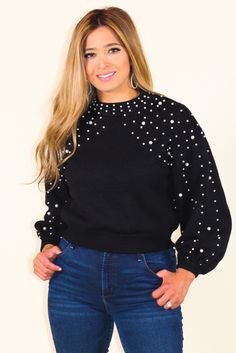 Pearls go with everything! So is this lovely pearl statement sweater! Featuring pearl detail on neckline and raglan balloon sleeves. -Color: Black -Waist-length style -Mock neck -Content: 52% Viscose 28% Polyester 20% Nylon -Imported -True to Size -Model is 5'5" and wearing size small Bedazzle Ideas, Statement Sweater, Jeweled Sweater, Embroidery Sweater, Outfit Invierno, Balloon Sleeves, Waist Length, Modern Fashion, Mock Neck