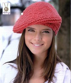 a woman wearing a red knitted hat