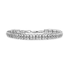 This gorgeous .925 sterling silver tennis bracelet features 1.0 carat total weight with 52 round, rose cut diamonds. The tennis bracelet has hinged links with two shapes surrounding two diamonds on each side. Rose-cut, promo quality diamonds are milky and cloudy in nature. The 7” bracelet has a lobster claw clasp. This authentic design is crafted of real 92.5% sterling silver that has been electro-coated with genuine rhodium (a platinum-family metal), ensuring it will keep a tarnish-free shine f Silver Diamond Bracelet, Silver Tennis Bracelet, Circle Diamond, Dec 8, Tennis Bracelet Diamond, Rose Cut Diamond, Tennis Bracelet, Diamond Heart, Silver Roses